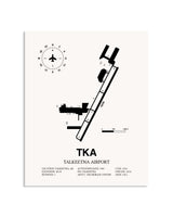 Gray Talkeetna Airport framed poster displayed in an airplane hangar