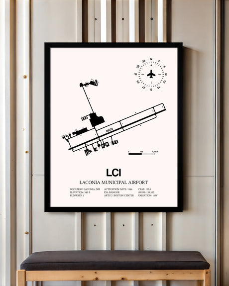 Laconia Municipal Airport framed poster displayed in an airplane hangar