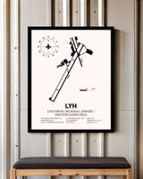 Lynchburg Regional Airport / Preston Glenn Field framed poster displayed in an airplane hangar