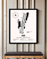 McConnell Air Force Base framed poster displayed in an airplane hangar