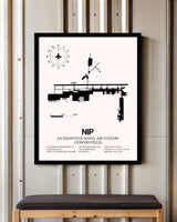 Jacksonville Naval Air Station (Towers Field) framed poster displayed in an airplane hangar