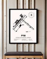 Plymouth Municipal Airport framed poster displayed in an airplane hangar