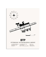 Gray Pittsburgh / Butler Regional Airport framed poster displayed in an airplane hangar