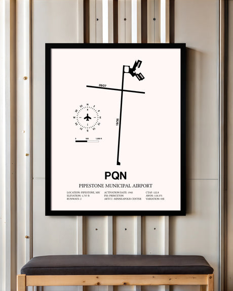 Pipestone Municipal Airport framed poster displayed in an airplane hangar
