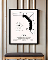 Lawrenceville-Vincennes International Airport framed poster displayed in an airplane hangar