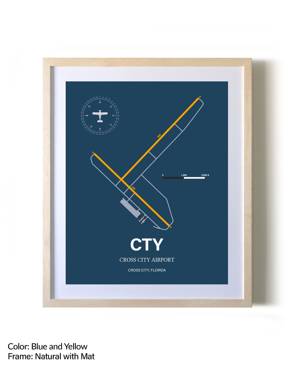 Cross City Airport framed print in natural wood frame with mat