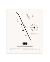Gray Salmon River Airfield framed poster displayed in an airplane hangar