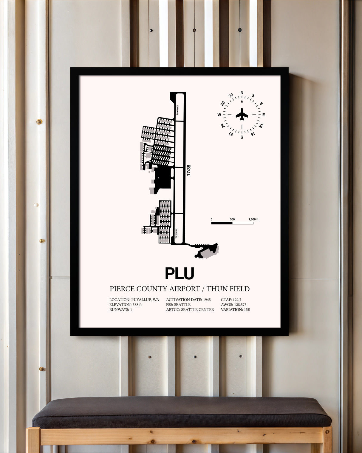 Pierce County Airport / Thun Field framed poster displayed in an airplane hangar