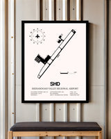 Shenandoah Valley Regional Airport framed poster displayed in an airplane hangar