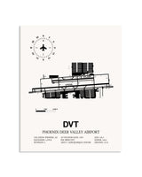 Gray Phoenix Deer Valley Airport framed poster displayed in an airplane hangar