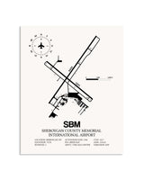 Gray Sheboygan County Memorial International Airport framed poster displayed in an airplane hangar
