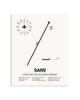 Gray Over the Top Aviation Airport framed poster displayed in an airplane hangar
