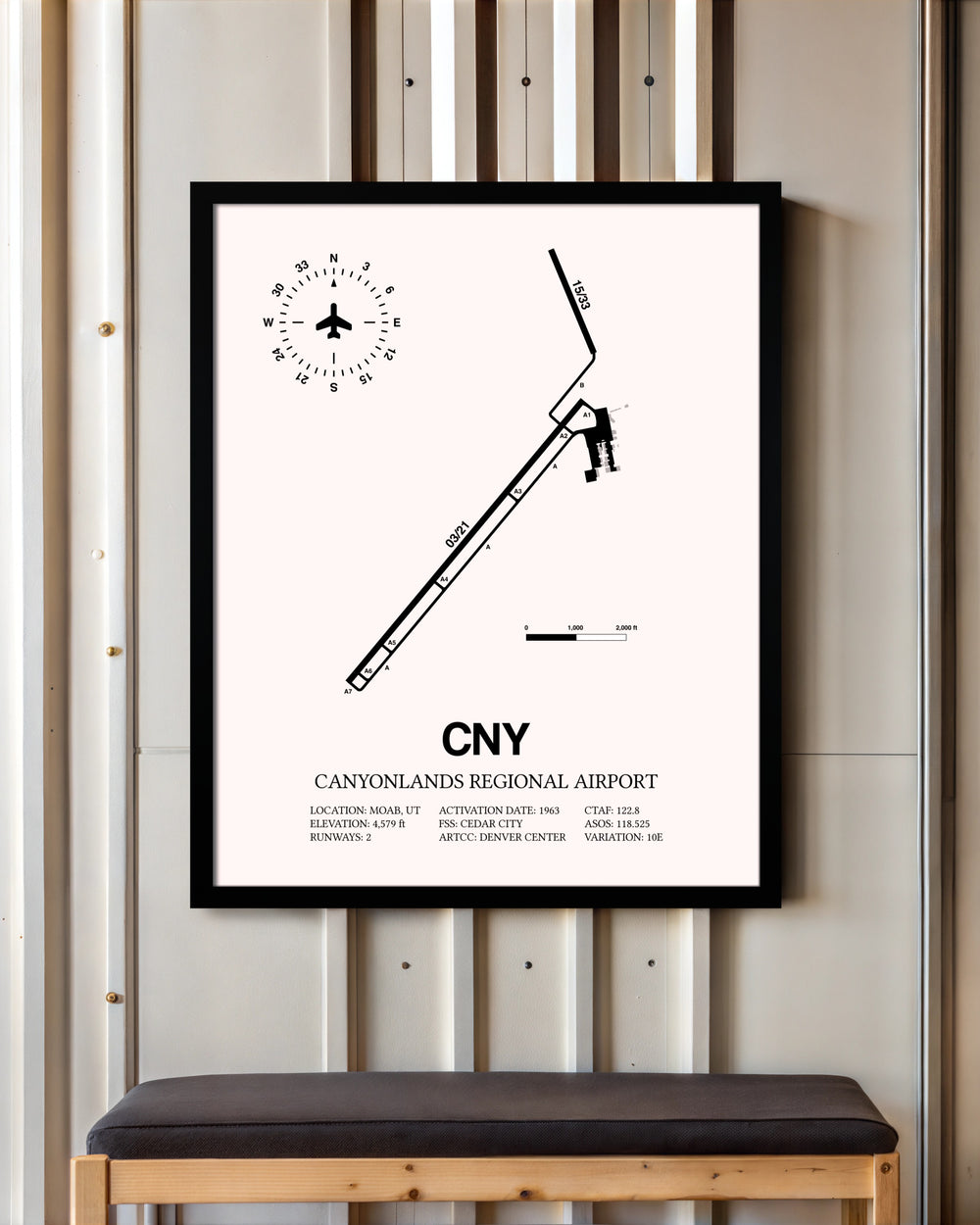 Canyonlands Regional Airport framed poster displayed in an airplane hangar