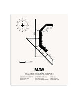 Gray Malden Regional Airport framed poster displayed in an airplane hangar