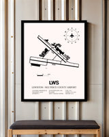 Lewiston / Nez Perce County Airport framed poster displayed in an airplane hangar