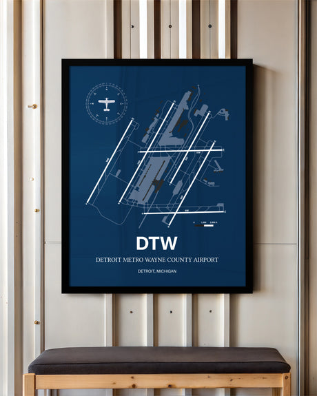 Detroit Metro Wayne County Airport framed poster displayed in an airplane hangar