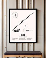 Curless Airport framed poster displayed in an airplane hangar