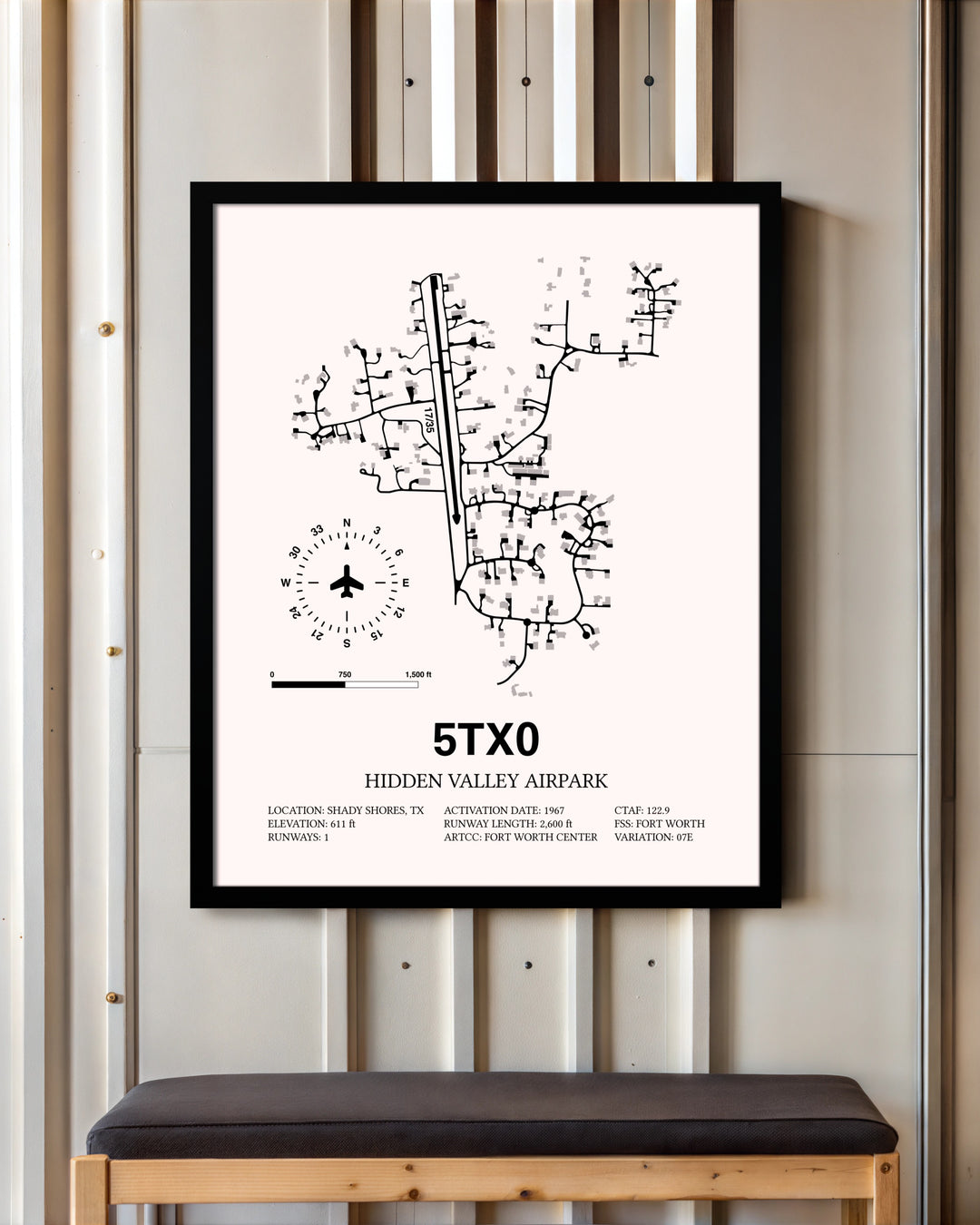 Hidden Valley Airpark framed poster displayed in an airplane hangar