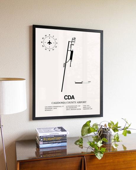 Caledonia County Airport aviation wall décor in black wood frame