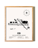 The Eastern Iowa Airport framed print in natural wood frame