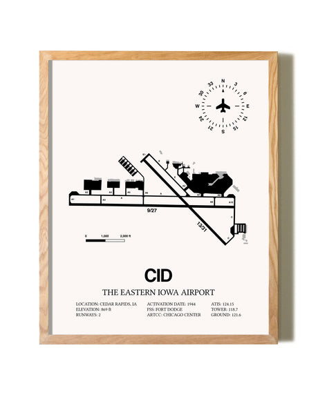 The Eastern Iowa Airport framed print in natural wood frame