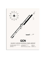 Gray Grand Canyon National Park Airport framed poster displayed in an airplane hangar