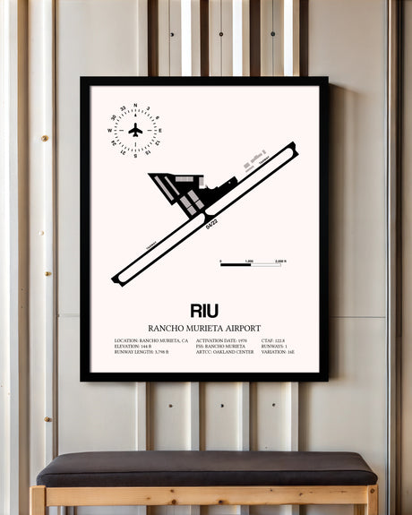 Rancho Murieta Airport framed poster displayed in an airplane hangar