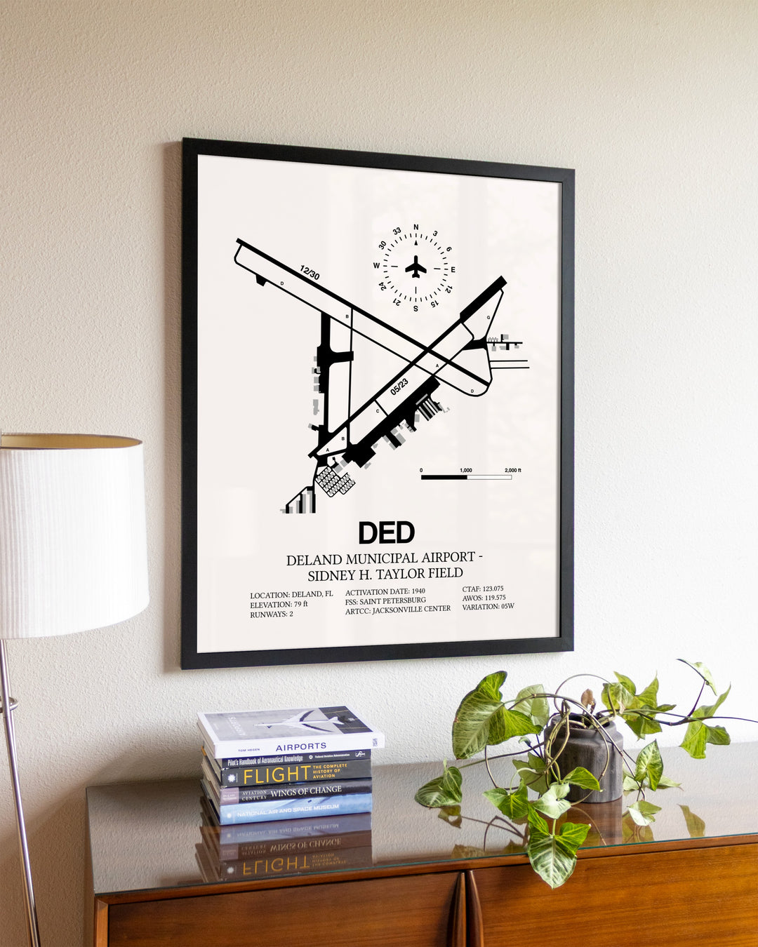Deland Municipal Airport-Sidney H Taylor Field aviation wall décor in black wood frame