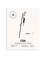 Gray Caledonia County Airport framed poster displayed in an airplane hangar