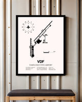 Tampa Executive Airport framed poster displayed in an airplane hangar
