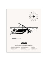 Gray Allegheny County Airport framed poster displayed in an airplane hangar