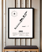 Durango-La Plata County Airport framed poster displayed in an airplane hangar