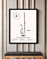 Highland-Winet Airport framed poster displayed in an airplane hangar
