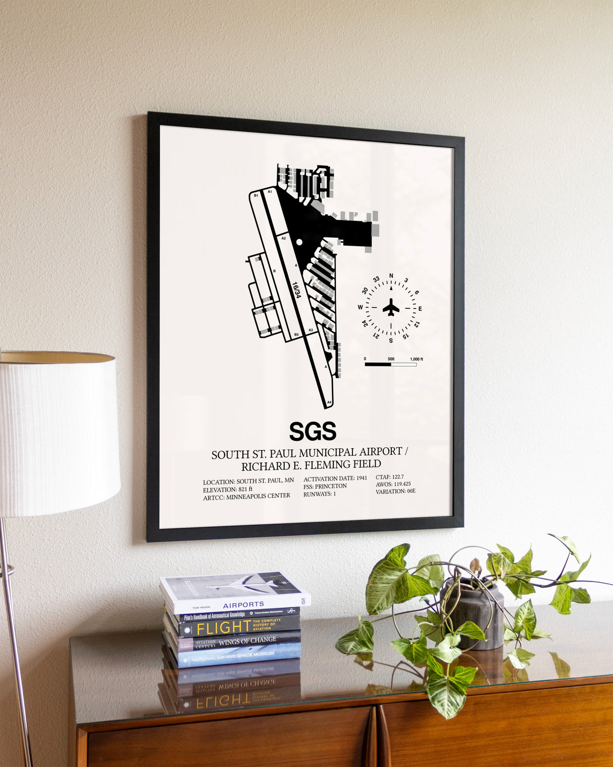 South St. Paul Municipal Airport / Richard E. Fleming Field aviation wall décor in black wood frame