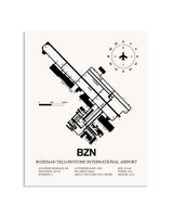 Gray Bozeman Yellowstone International Airport framed poster displayed in an airplane hangar