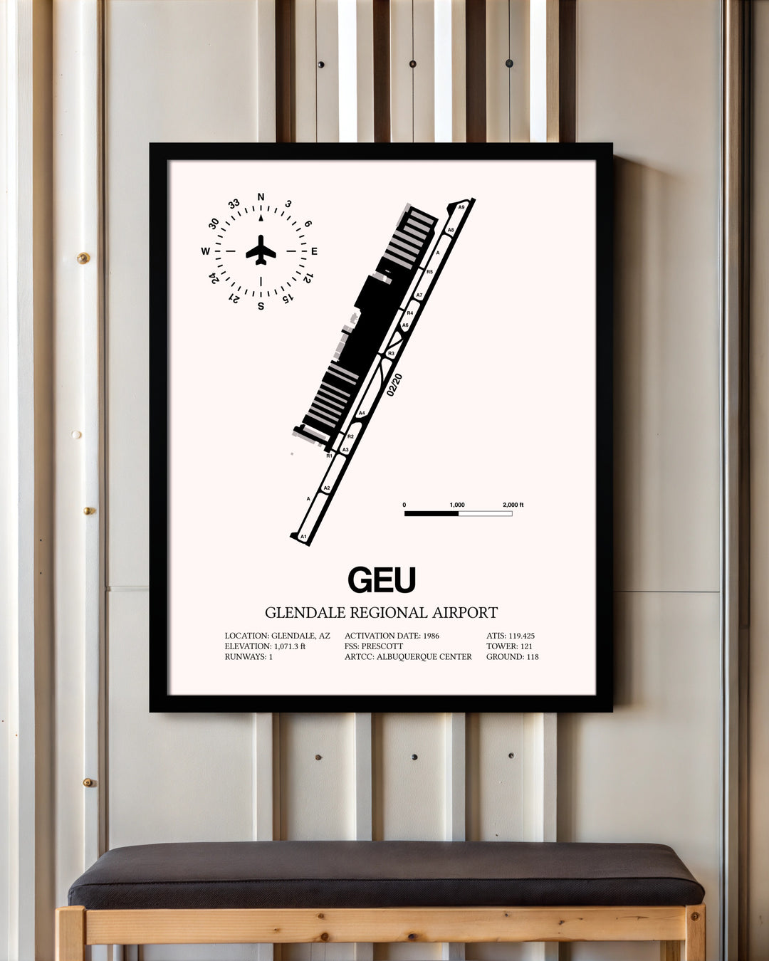 Glendale Regional Airport framed poster displayed in an airplane hangar