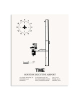 Gray Houston Executive Airport framed poster displayed in an airplane hangar