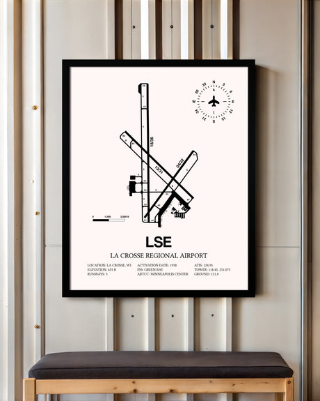 La Crosse Regional Airport framed poster displayed in an airplane hangar