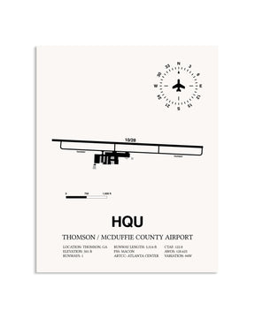 Gray Thomson / McDuffie County Airport framed poster displayed in an airplane hangar