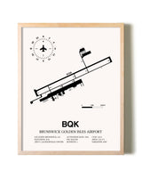 Brunswick Golden Isles Airport framed wall art in white frame