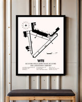 McGuire Field (Joint Base McGuire Dix Lakehurst) Airport framed poster displayed in an airplane hangar