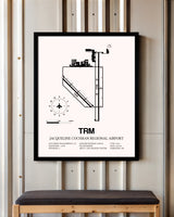 Jacqueline Cochran Regional Airport framed poster displayed in an airplane hangar