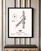 River Falls Airport framed poster displayed in an airplane hangar