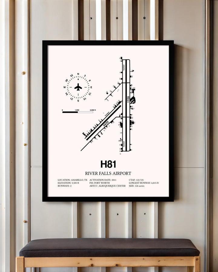 River Falls Airport framed poster displayed in an airplane hangar