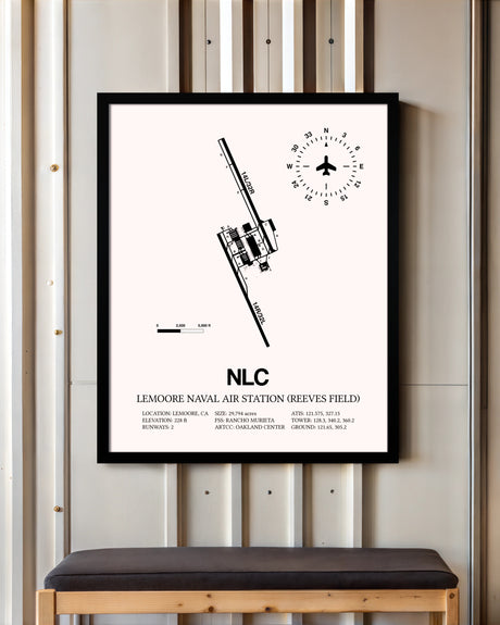 Lemoore Naval Air Station (Reeves Field) framed poster displayed in an airplane hangar
