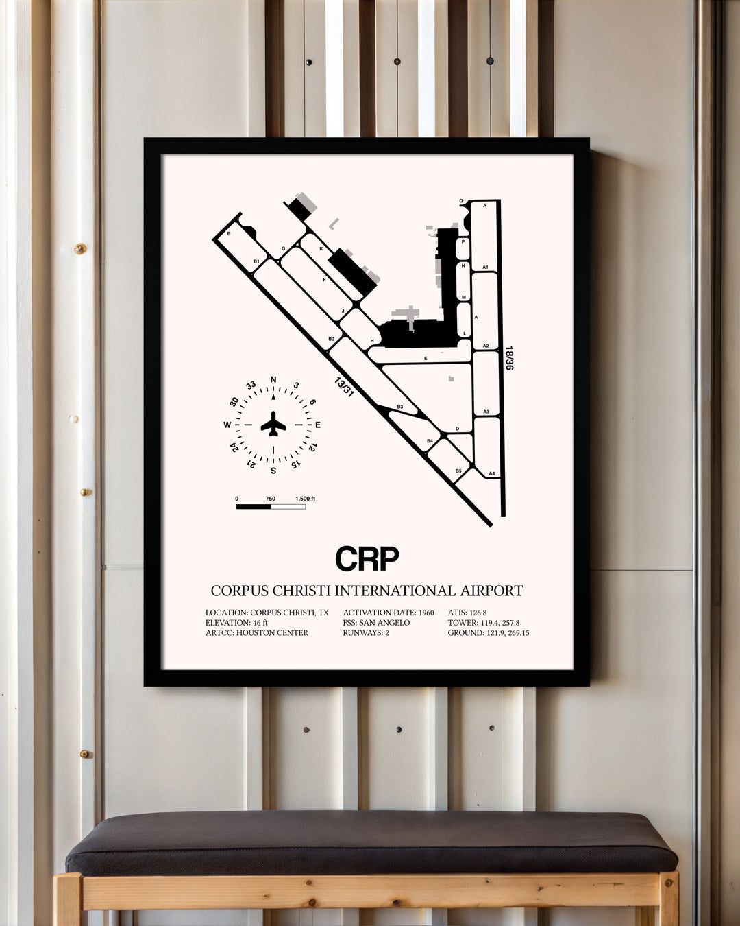 Corpus Christi International Airport framed poster displayed in an airplane hangar