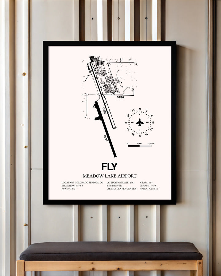 Meadow Lake Airport framed poster displayed in an airplane hangar