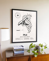 Spruce Creek Airport aviation wall décor in black wood frame