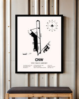 TSTC Waco Airport framed poster displayed in an airplane hangar