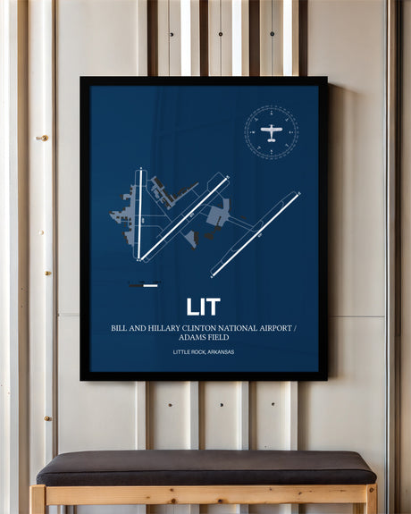 Bill and Hillary Clinton National Airport/Adams Field framed poster displayed in an airplane hangar